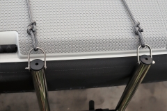 Ladder is stored inside the storage bag under the deck, once you take the ladder out you can flick it over the deck and extend it .